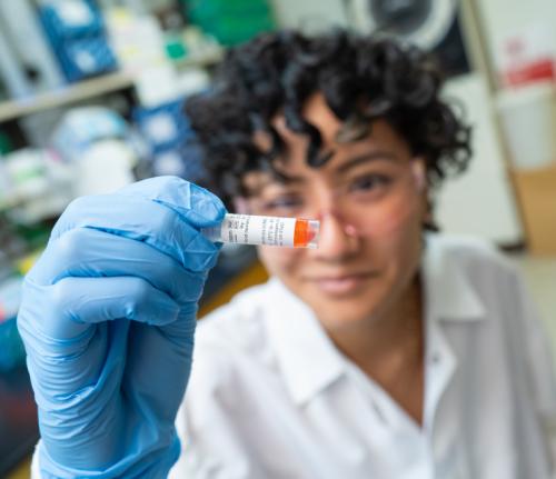 PREP scholar inspects a sample