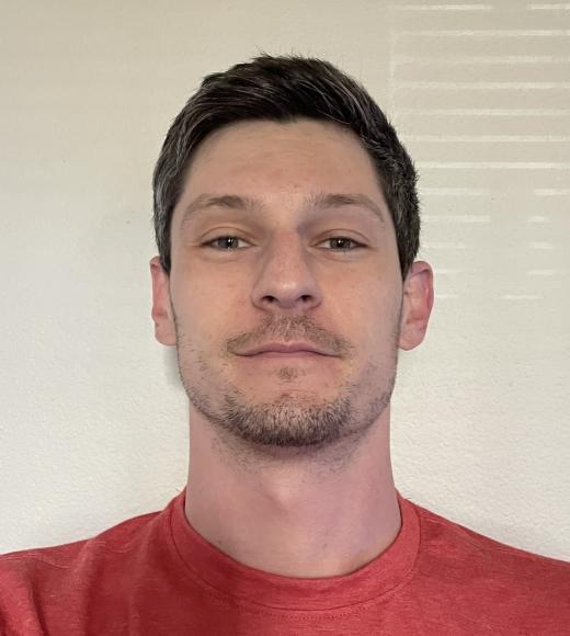 man in red tee shirt