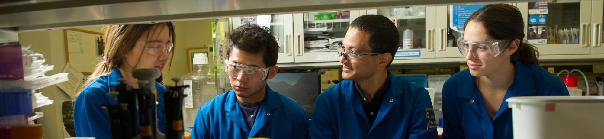 Faculty member Aldrin Gomes with members of his lab