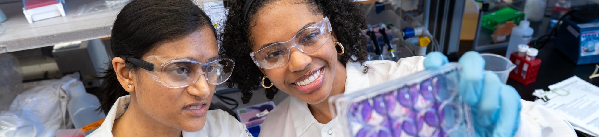 A PREP scholar shares research results with her mentor